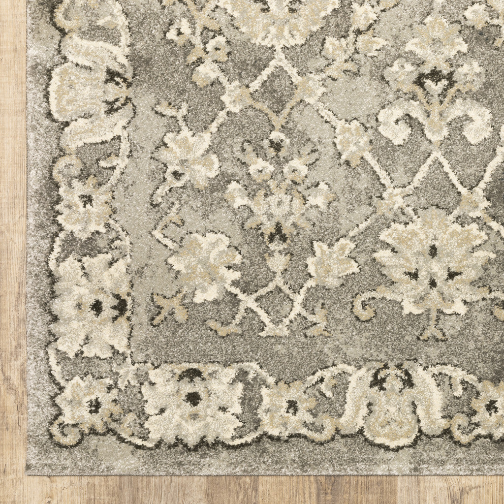 6 X 9 grey Beige Tan And Brown Oriental Power Loom Stain Resistant Area Rug