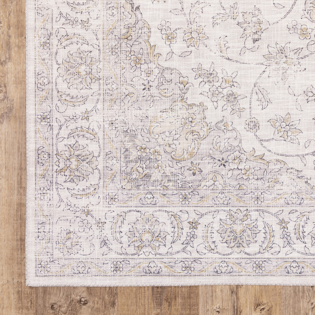 9 X 12 Beige gold And grey Oriental Power Loom Stain Resistant Area Rug