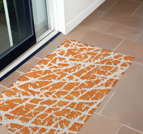 2 X 3 Orange and White Abstract Washable Non Skid Indoor Outdoor Area Rug