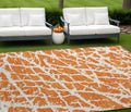 9 X 12 Orange and White Abstract Washable Non Skid Indoor Outdoor Area Rug