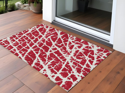 2 X 3 Red and White Abstract Washable Non Skid Indoor Outdoor Area Rug