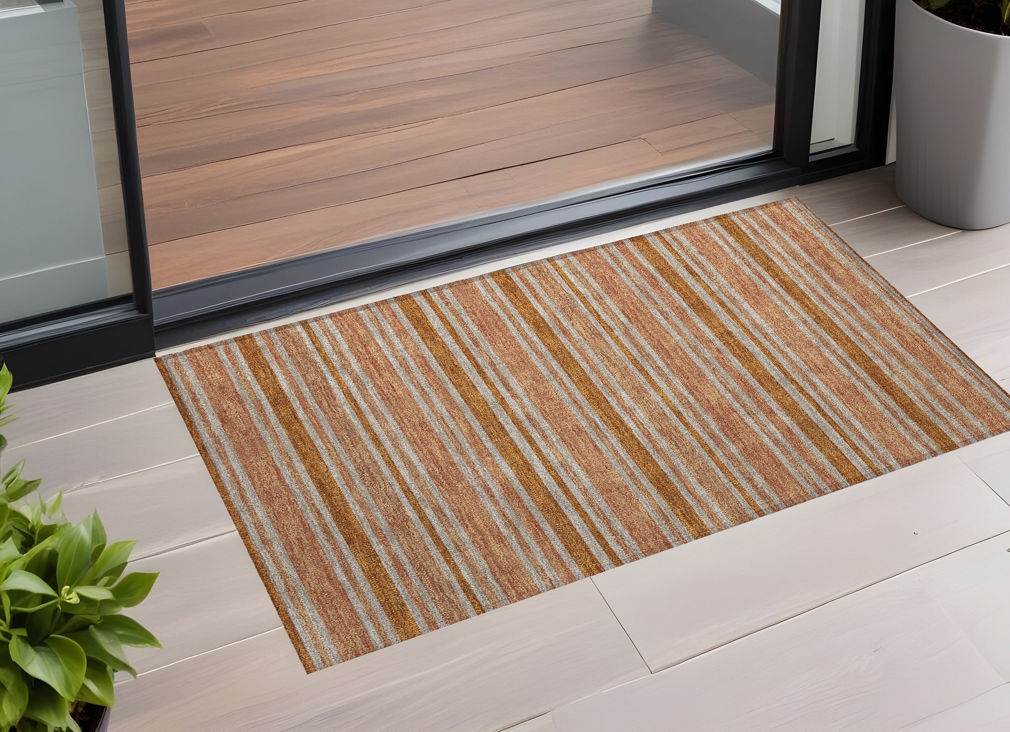 2 X 3 Beige and Orange Striped Washable Non Skid Indoor Outdoor Area Rug
