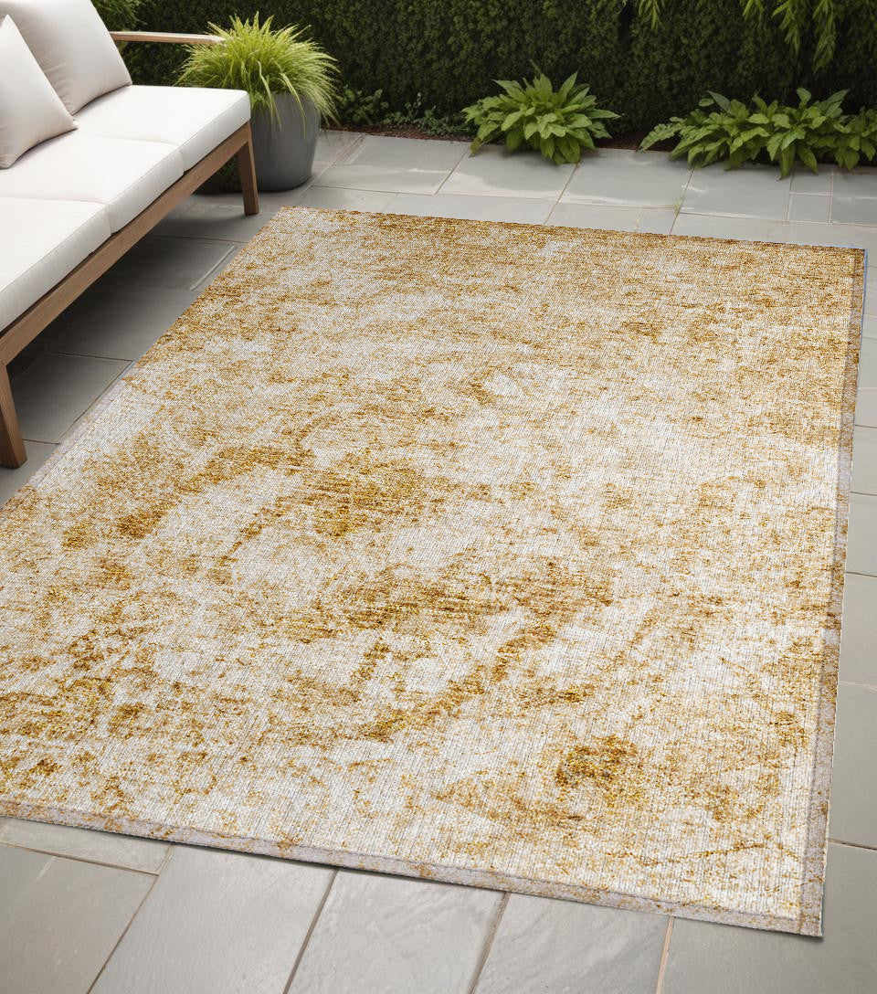 5 X 8 Cream and Gold Abstract Washable Non Skid Indoor Outdoor Area Rug