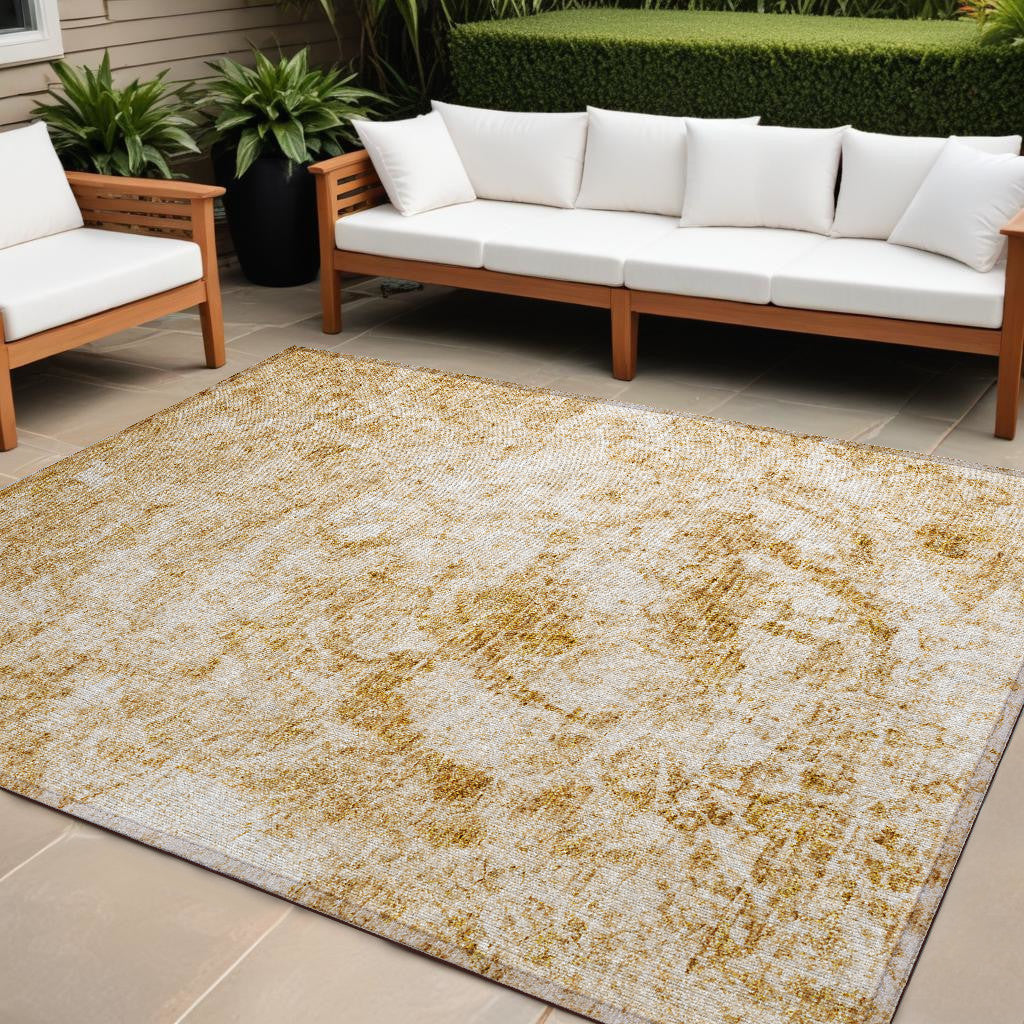 10 X 14 Cream and Gold Abstract Washable Non Skid Indoor Outdoor Area Rug