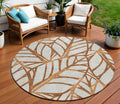 8 Orange Beige And Copper Round Floral Washable Indoor Outdoor Area Rug