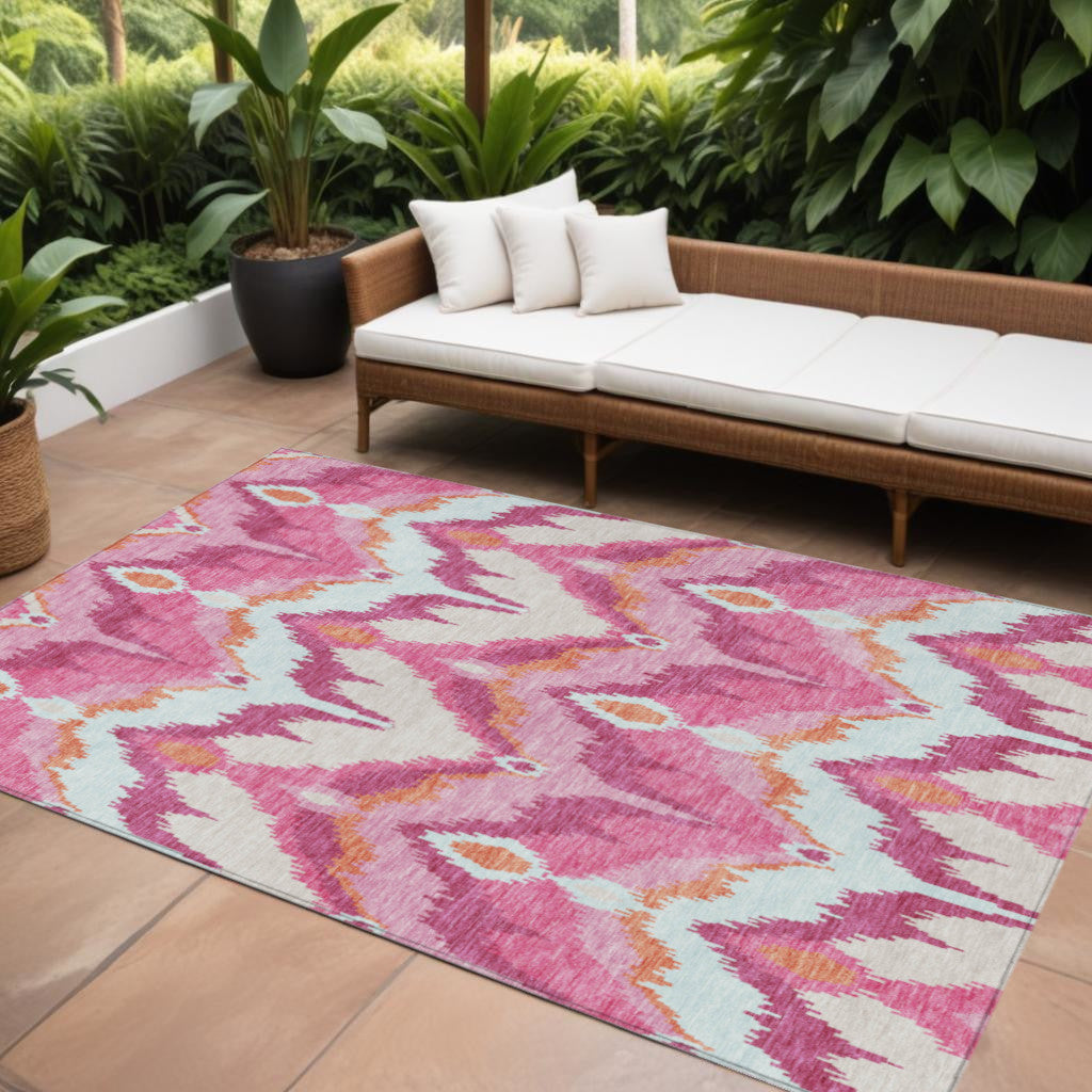 10 X 14 Pink Mauve And Orange Ikat Washable Indoor Outdoor Area Rug
