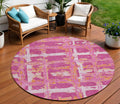8 Blush Pink And Orange Round Striped Washable Indoor Outdoor Area Rug