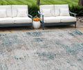 9 X 12 Teal Blue Beige And Copper Abstract Washable Indoor Outdoor Area Rug
