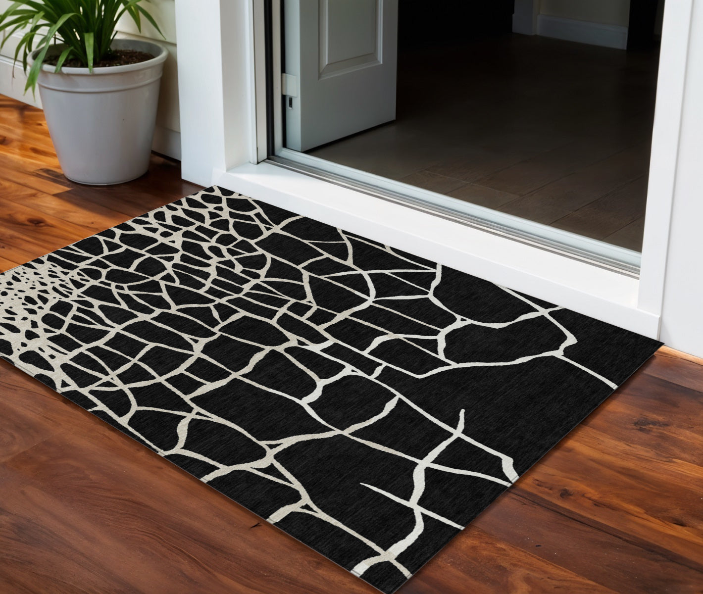 3 X 5 Black And Beige Abstract Washable Indoor Outdoor Area Rug