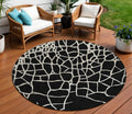 8 Black And Beige Round Abstract Washable Indoor Outdoor Area Rug