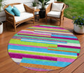 8 Lavender Orange And Lime Green Round Striped Washable Indoor Outdoor Area Rug