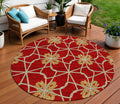 8 Orange And Gold Round Geometric Washable Indoor Outdoor Area Rug