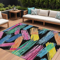 10 X 14 Black Pink Yellow Orange And Blue Striped Washable Indoor Outdoor Area Rug