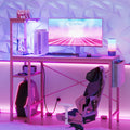Bestier Pink Gaming Desk with Power Outlets, 44 Inch Led Gamer Desk with 4 Tiers Reversible Shelves, Computer Desk with Headset 